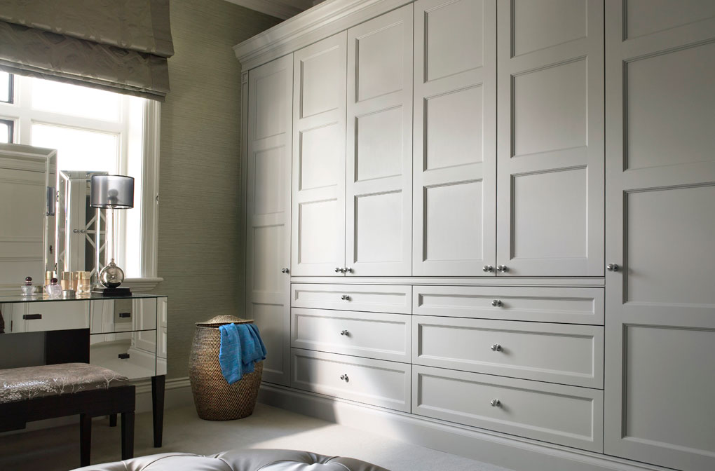 Fitted bespoke wardrobes with panels, by The English Wardrobe Company